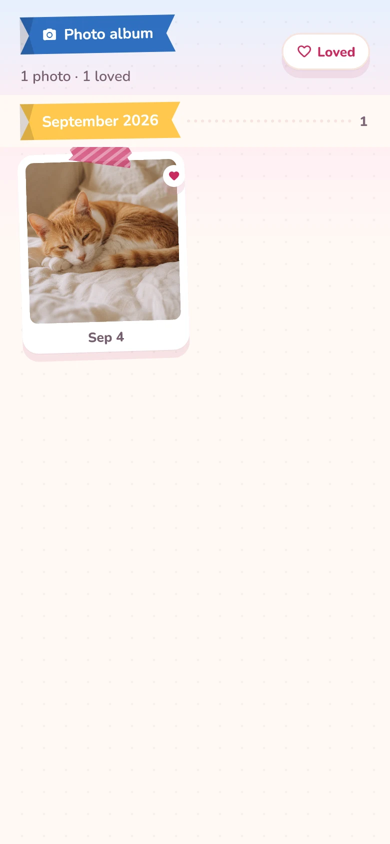 Actual Everwhisker Album screen with a monthly photo group, taped photo card and Loved filter